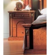Vertical accents applied to a bed footboard and beside table