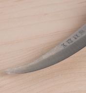 Close-up of curved knife blade