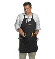 Front view of a man wearing the apron with tools in the pockets