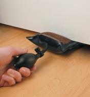Using a Winbag Air Wedge to lift a door