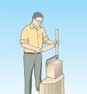 Illustration of a man using a shingle and riving froe with a froe mallet to split a block of wood