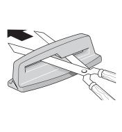 Illustration of shears being inserted into the sharpener