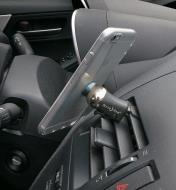 Steelie Mobile Device Vent Mount attached to a car vent, holding a cell phone