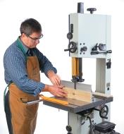 Using the bandsaw fence in the vertical orientation to resaw a board