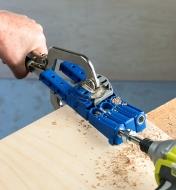 The Kreg pocket-hole jig held in place with the Kreg face-frame clamp