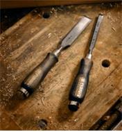 Two Narex Classic Bevel-Edge Chisels lying on a workbench