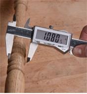 Measuring the width of a chair spindle with the 6" Blindman's Caliper