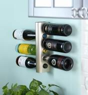 Wine Rack installed on a wall, holding six bottles