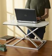 Using a laptop supported on a Height-Adjustable Work Stand