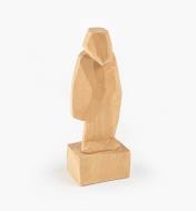 Carving of a person made from basswood blank