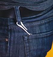 KeySmart Dangler XL attached to a jeans belt loop with the end holding the keys tucked into a back pocket