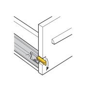 Illustration of release lever on a slide installed in a drawer