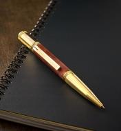 Example of a Sierra Diverse gold pen turned from a wood blank