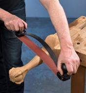 Sanding a chair leg with the Large Bow Sander
