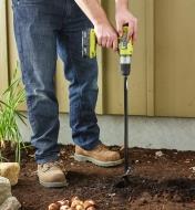 Drilling into soil with the Garden Auger 
