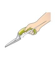 L'illustration montre la position du poignet lorsqu'on tient l'outil