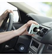 Attaching a cell phone to the vent-mount kit installed in a car vent