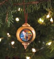 The workshop ornament hanging on a Christmas tree