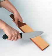 Sharpening a chef's knife on a Leather Strop