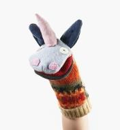 A completed unicorn puppet on a person’s hand