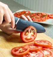 Slicing a tomato with the santoku knife