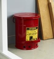 A flammable-waste can placed in a workshop