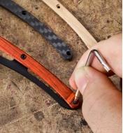 The personalized knife kit being assembled using the included padauk handle scale