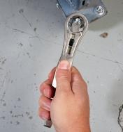 Turning a bolt with the adjustable slide wrench