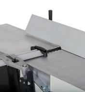 The adjustable fence on the Rikon 10" helical planer/jointer set at an angle for bevelling stock 