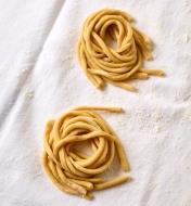Fresh bucatini noodles made with the Marcato Pasta Extruder