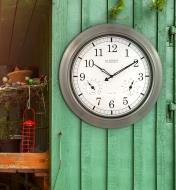 Atomic radio-controlled clock mounted on the wall of a garden shed