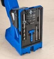 The included drill bit, driver bits and thickness gauge held in storage slots in the 720 jig base