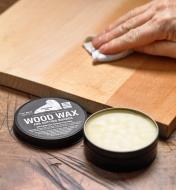 Applying Walrus Oil cutting board wax to the unfinished surface of a newly made wooden cutting board
