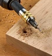 A countersunk screw hole drllled with one of the countersink bits from the drill, drive and plug set