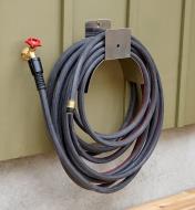 A 50-foot Viper hose spooled on a hose hanger