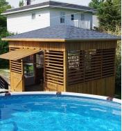 Example of louvers installed on a backyard pool house