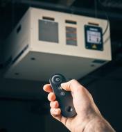Pointing a remote control at the Rikon 1100 CFM air cleaner