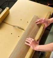 Cutting stock on a table saw using a sled made with two Zeroplay miter bars
