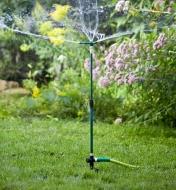 Telescoping Rain Sprinkler watering a garden