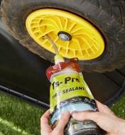 Adding Ts-Pro tire sealant to a wheelbarrow tire