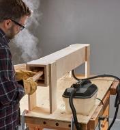 Placing a wooden workpiece inside a steam box connected to an Earlex steam generator