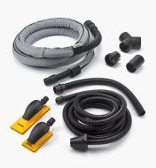 Two hand-sanding blocks, various vacuum fittings and hoses, and a hose sleeve included with the kit