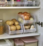 Stackable light-duty storage bins used in a pantry to hold potatoes, onions, garlic and other foods