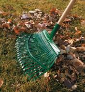 Using the flexrake to rake leaves into a pile