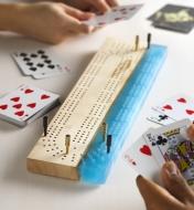 Two players playing a game of cribbage