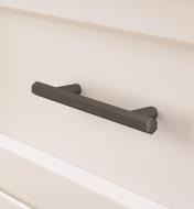Matte black Caliber handle mounted horizontally to a drawer