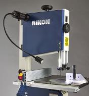 A flex-neck LED work light mounted on the Rikon 10-3061 and extended over the saw’s machine table