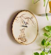 The completed pyrography clock project on display