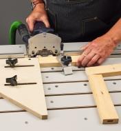 A Domino joiner used on a Veritas Domino joinery table to cut butt-joint mortises in side grain