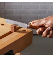 Making fine cuts in a small wood piece using an ultra-thin razor saw
